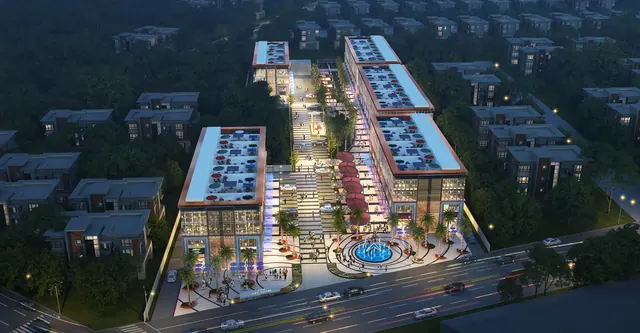 Paras Arcade 114 — aerial at night (render)