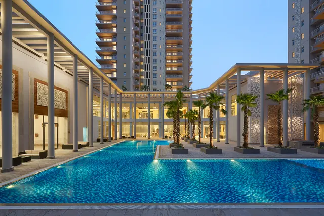 Puri Diplomatic Greens — clubhouse pool (real photo)