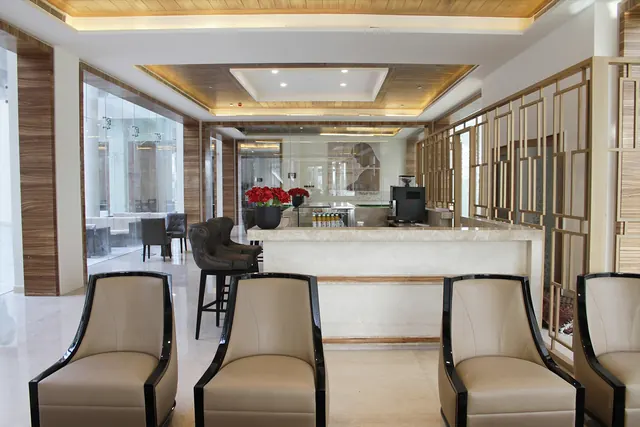 Puri Diplomatic Greens — clubhouse cafe lounge (real photo)