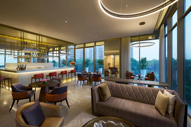Puri Diplomatic Residences — clubhouse lounge bar (real photo)