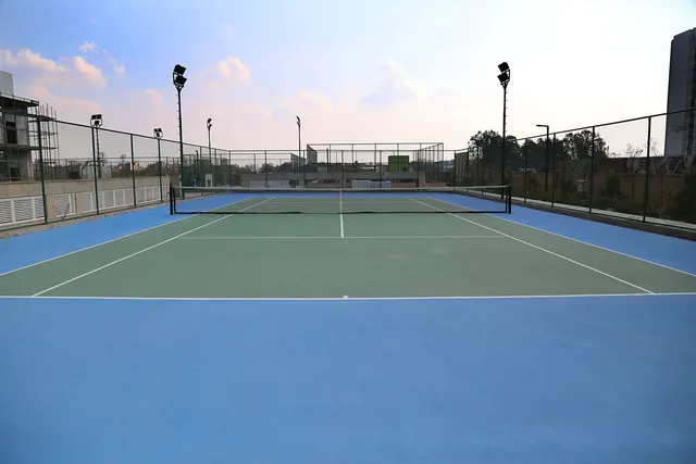 Puri Emerald Bay — tennis court (real photo)
