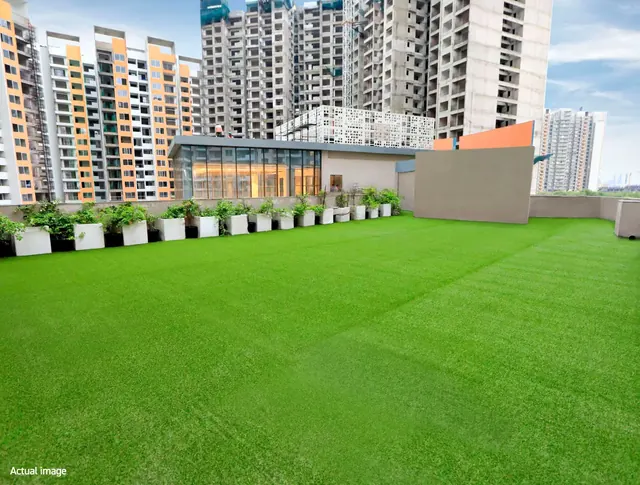 Shapoorji Joyville — podium lawn (actual photo)