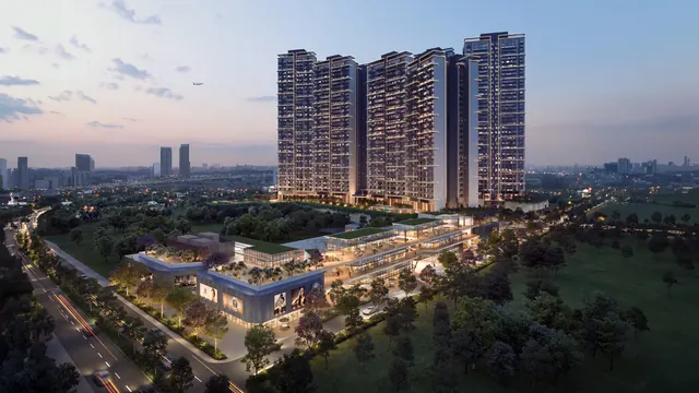 Signature Global Deluxe DXP 37D — towers and podium aerial at dusk