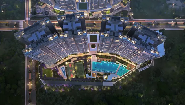 Signature Global Deluxe DXP 37D — top-down aerial with pool