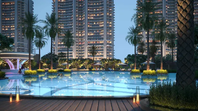 Smartworld One DXP — towers and pool at dusk