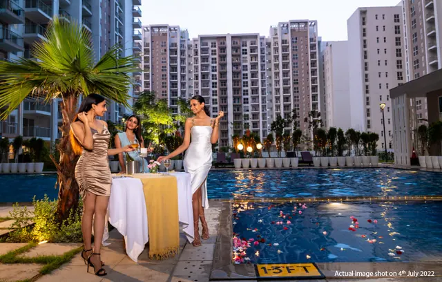 Tata La Vida — swimming pool at dusk (actual photo, with people)