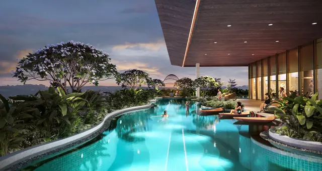 TREVOC Royal Residences — clubhouse pool deck at dusk (render)